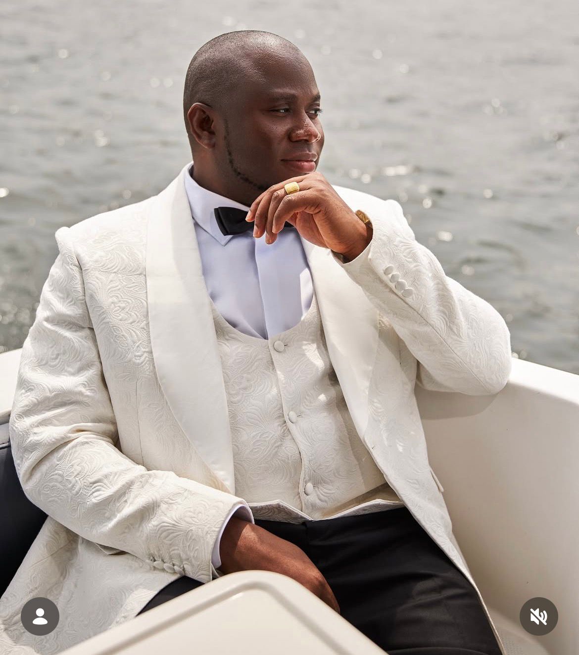 Qasim Abiola Oderinde on a boat in Lagos
